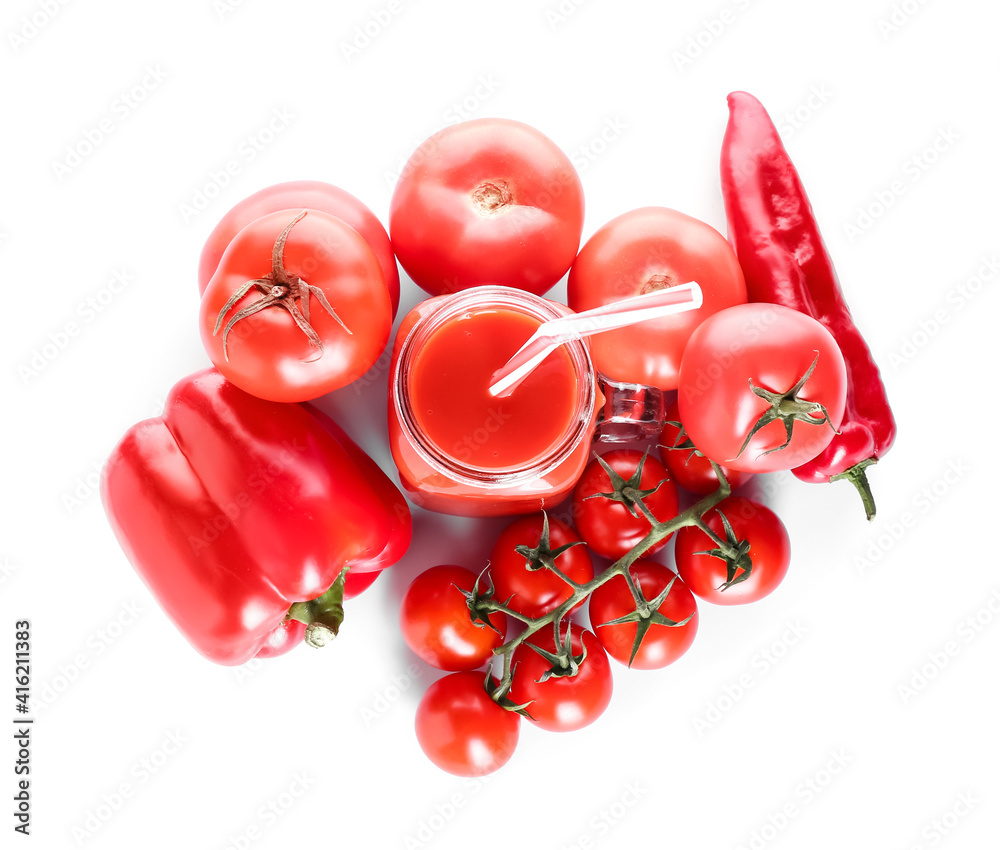 Mason jar of healthy smoothie with tomato and bell pepper on white background