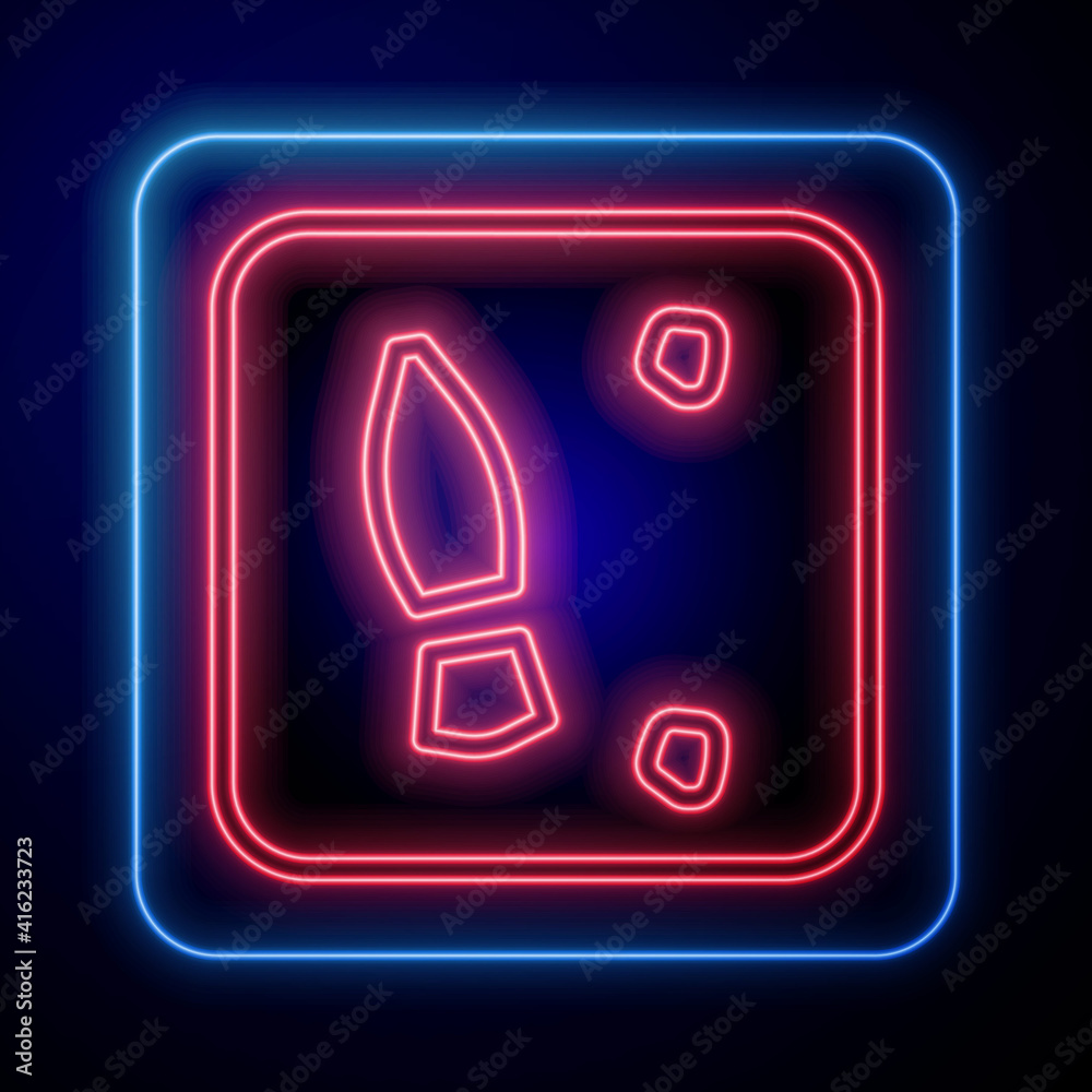 Glowing neon Human footprints shoes icon isolated on black background. Shoes sole. Vector.