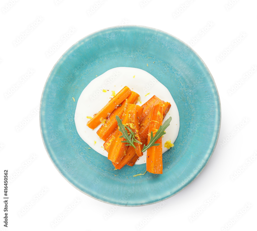 Plate of tasty baked carrot on white background