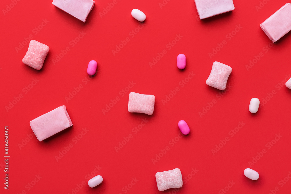 Chewing gums on color background