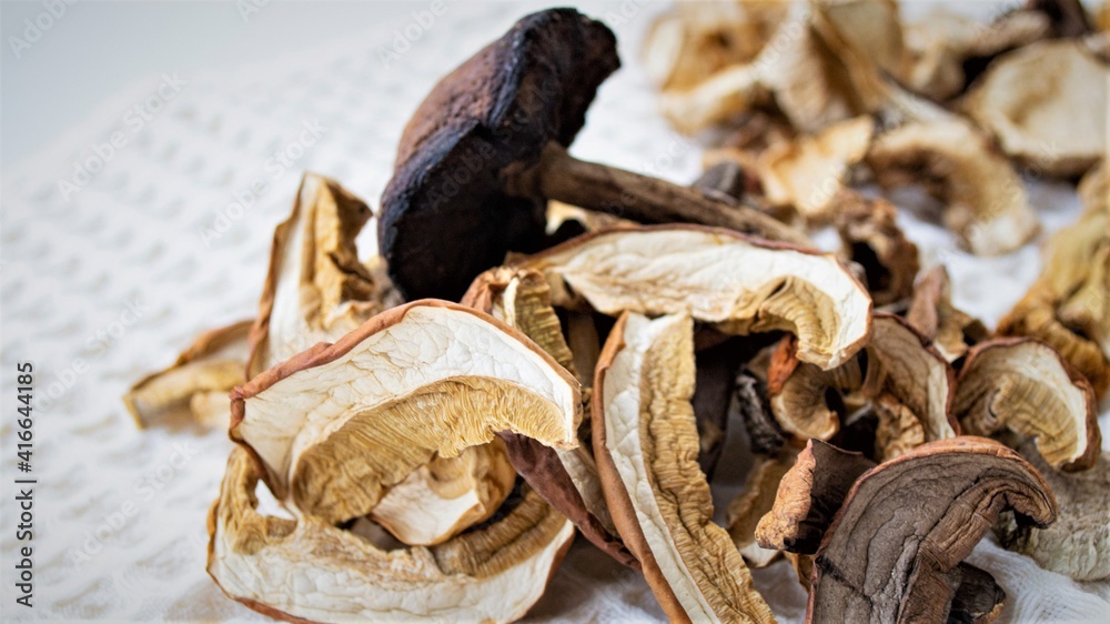 Dried mushrooms on a kitchen waffle towel