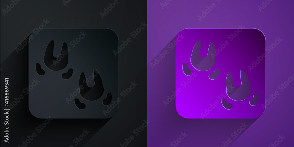 Paper cut Wild boar paw footprint icon isolated on black on purple background. Paper art style. Vect