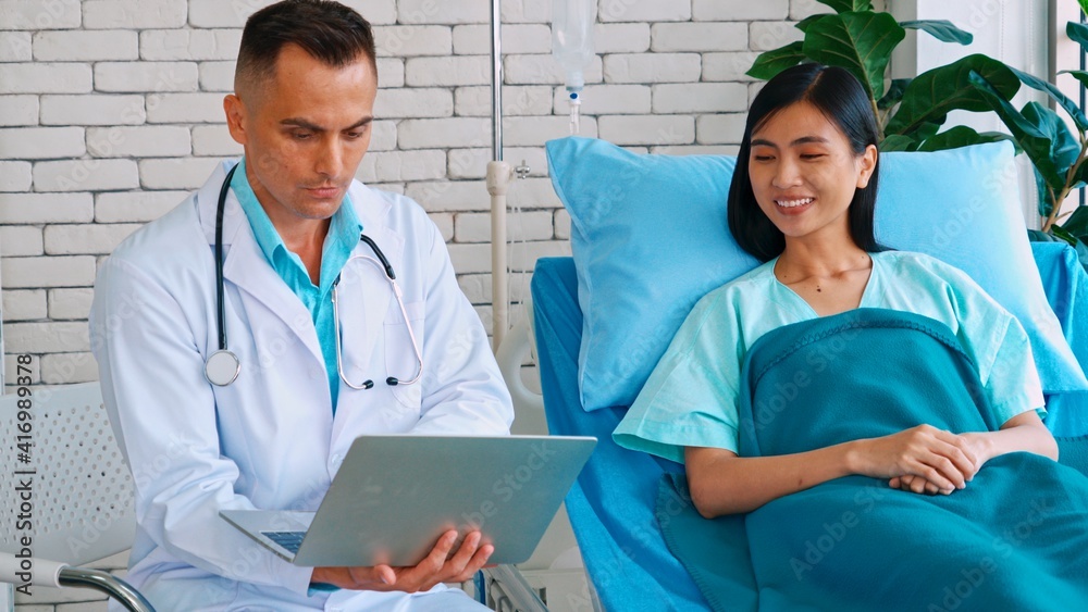 Doctor in professional uniform examining patient at hospital or medical clinic. Health care , medica