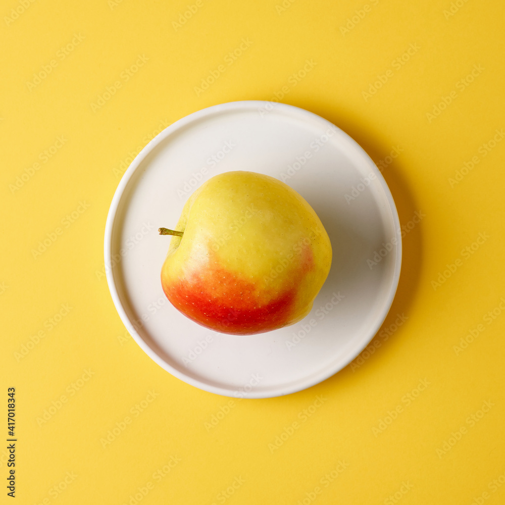 apple on white plate