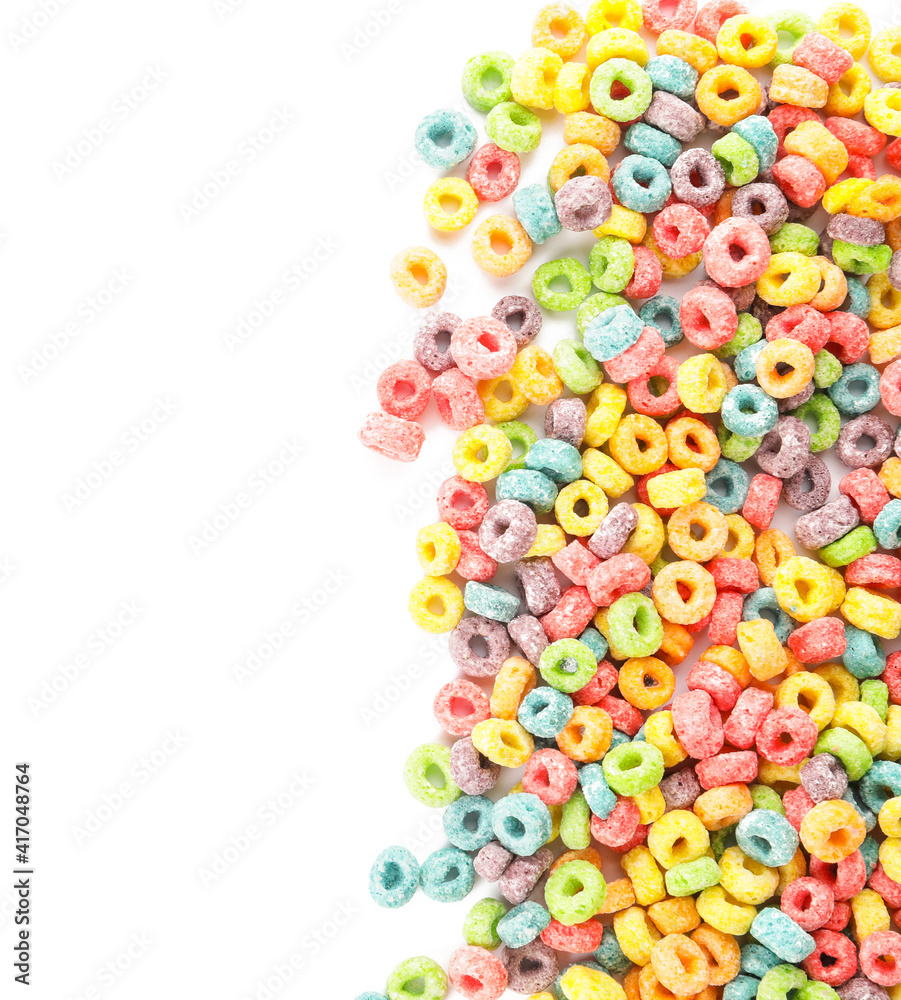 Tasty cereal rings on white background