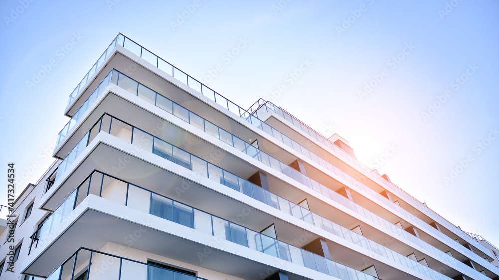 Apartment residential house and home facade architecture and outdoor facilities. Blue sky on the bac