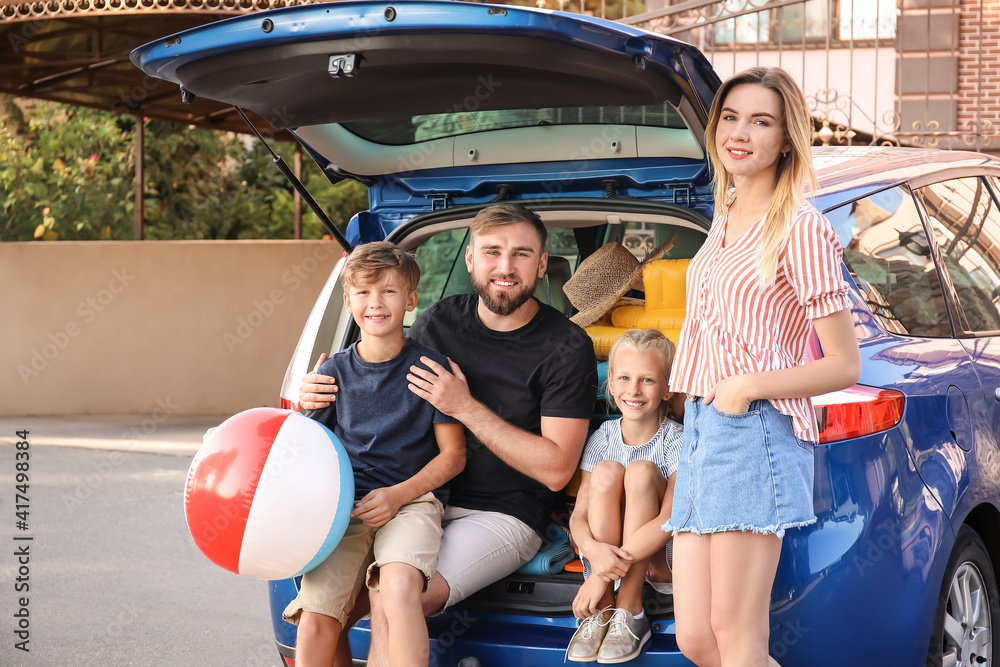 Happy family near car outdoors