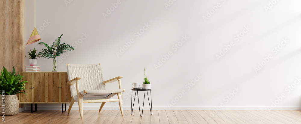 Modern minimalist interior with an armchair on empty white wall background.