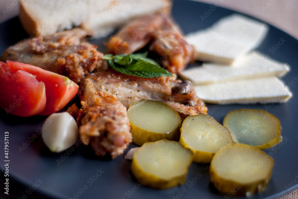 Sliced ​​bread meat and vegetables close-up.