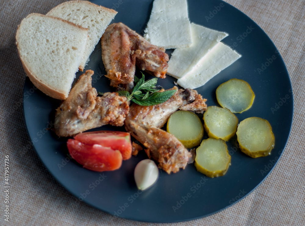 Sliced ​​bread meat and vegetables close-up.