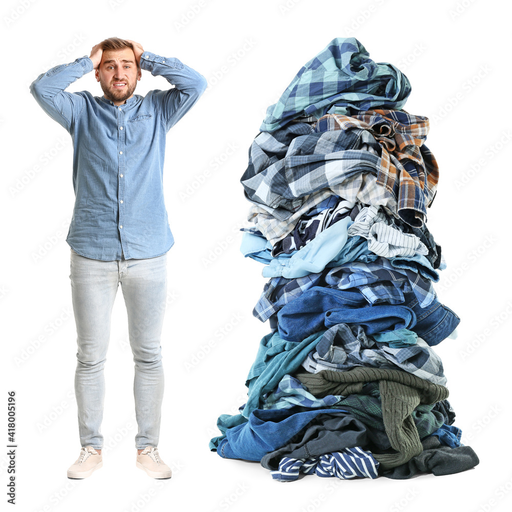 Basket with laundry on white background