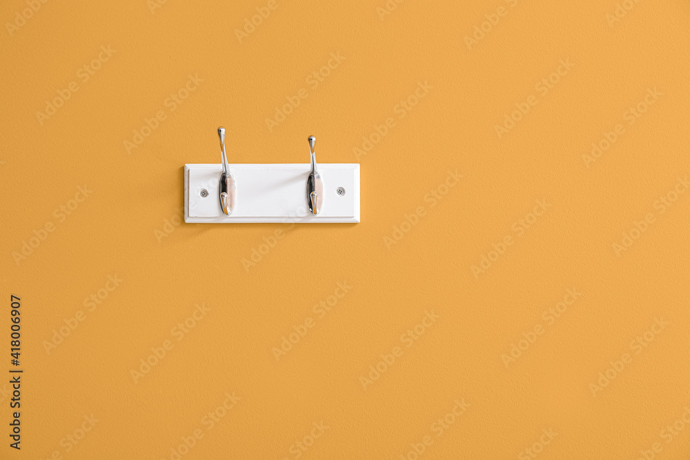 Stylish hanger on color background