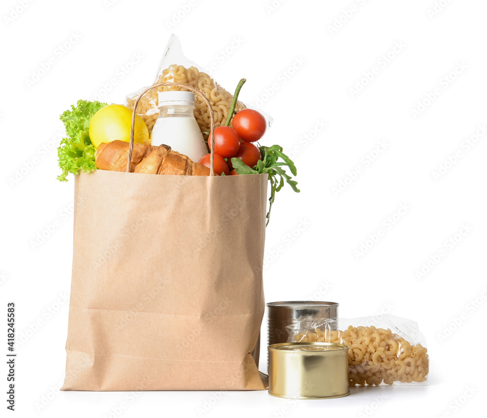 Shopping bag with different products on white background