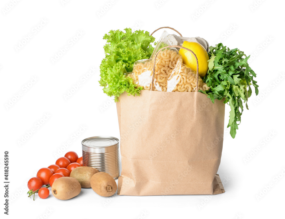 Shopping bag with different products on white background