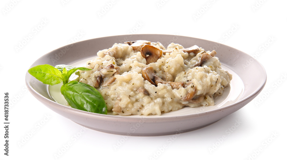 Plate with tasty risotto on white background