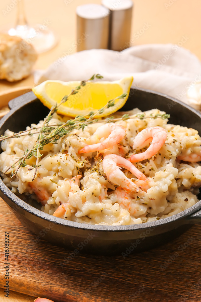 Frying pan with tasty risotto, closeup