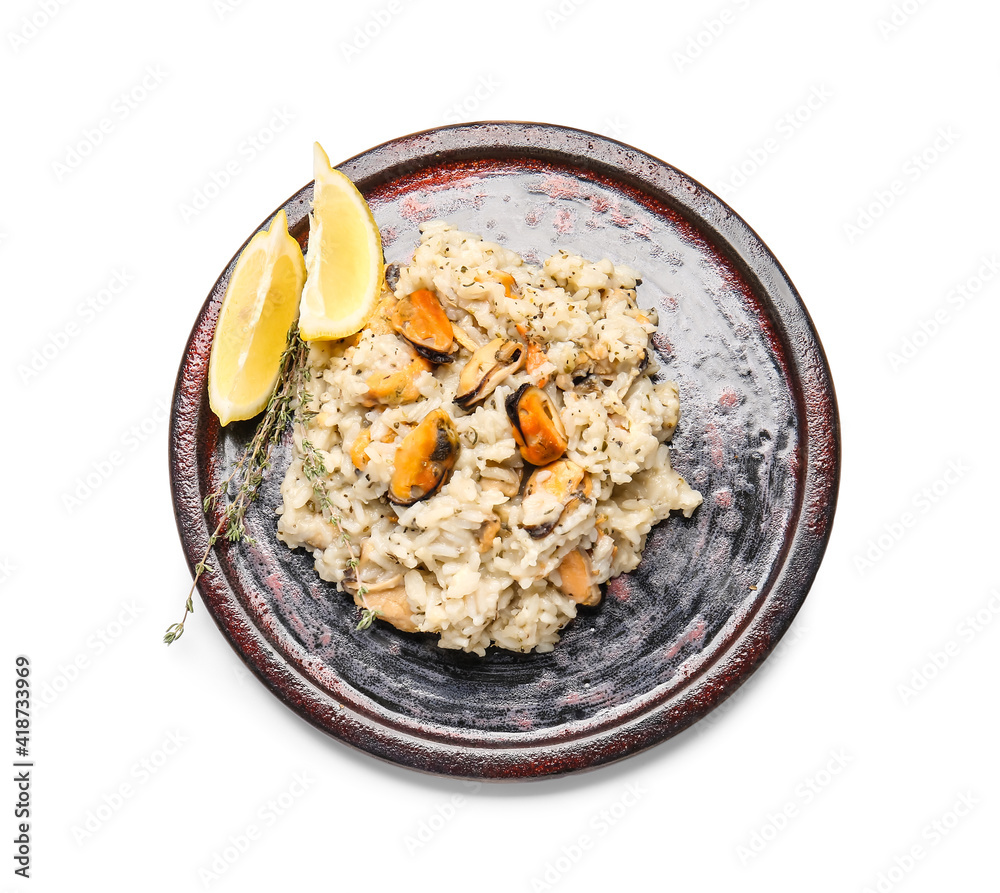 Plate with tasty risotto on white background