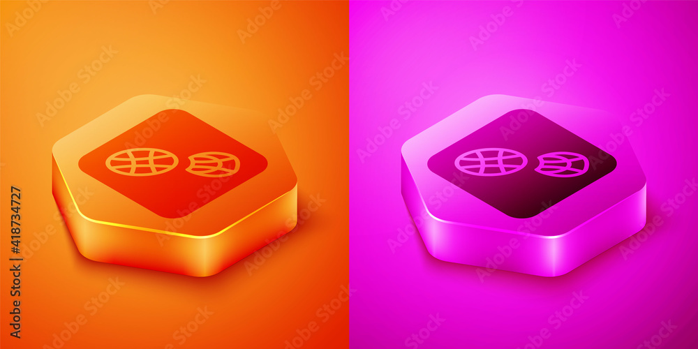 Isometric Human footprints shoes icon isolated on orange and pink background. Shoes sole. Hexagon bu