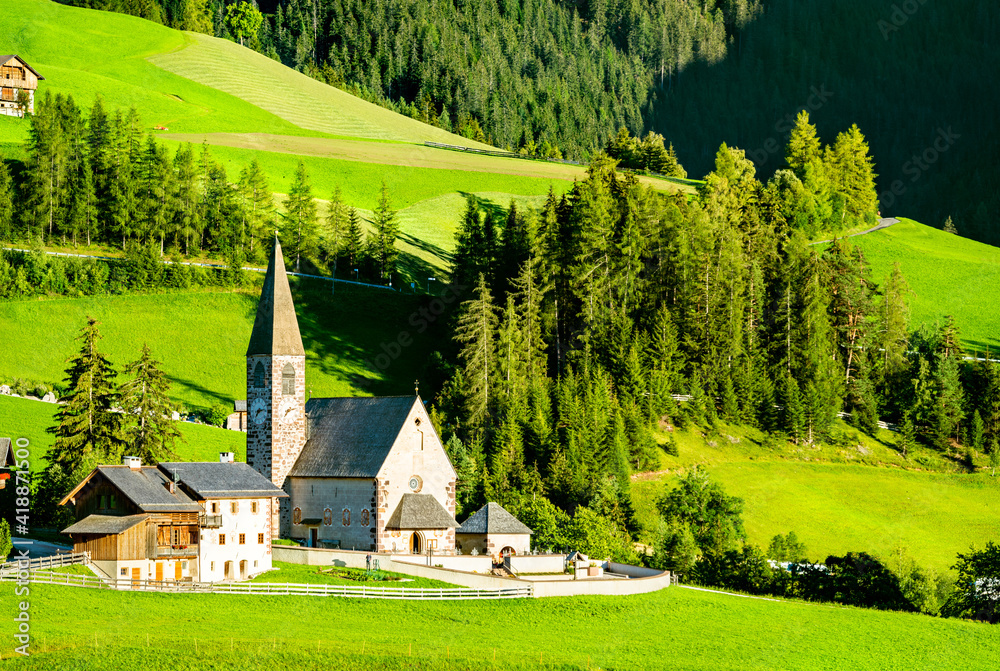 View of Val di Funes with the Chruch of Santa Maddalena in the Dolomites Mountains. UNESCO world her