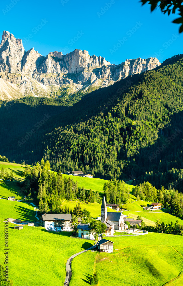 View of Val di Funes with the Chruch of Santa Maddalena in the Dolomites Mountains. UNESCO world her