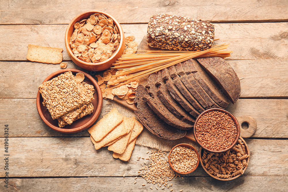 Set of different products on wooden background