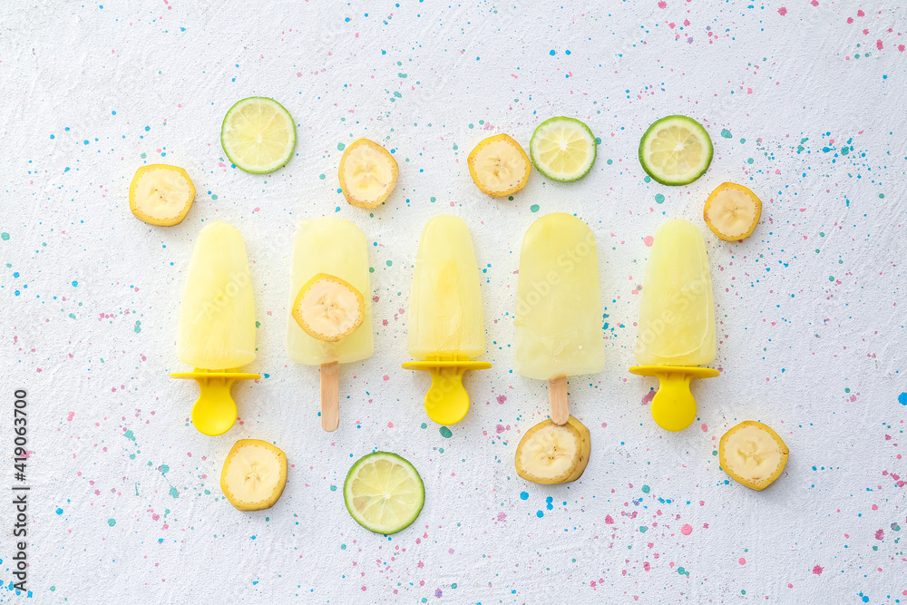 Tasty banana ice-cream on light background