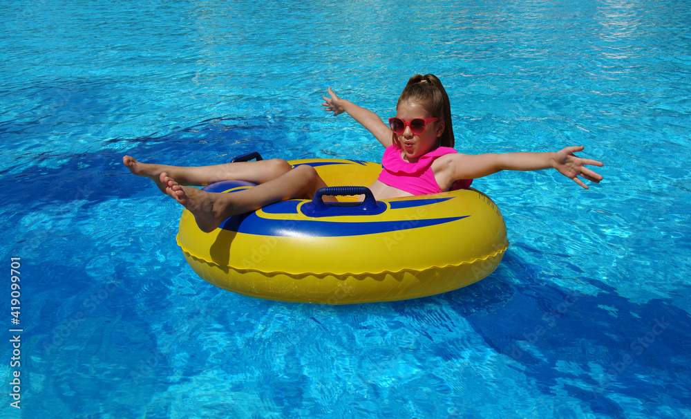 Little girl with inflatable ring