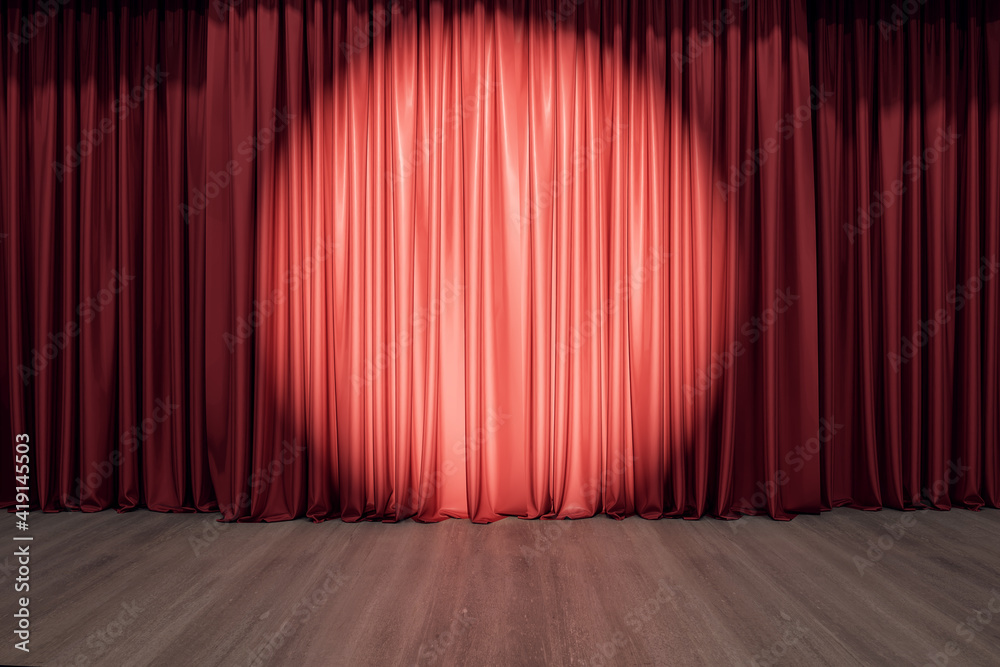 Round spotlight on red curtain on the stage with wooden floor