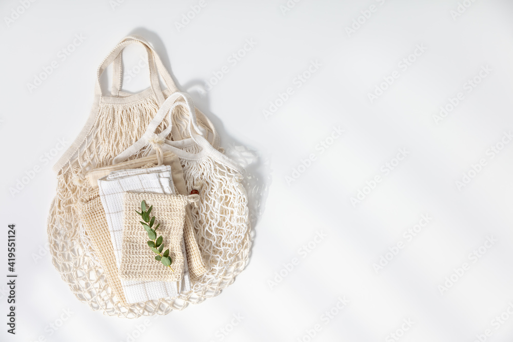 Reusable shopping bags on white background. Zero waste concept.