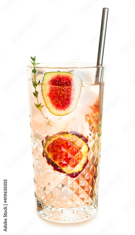 Glass of tasty fig lemonade on white background