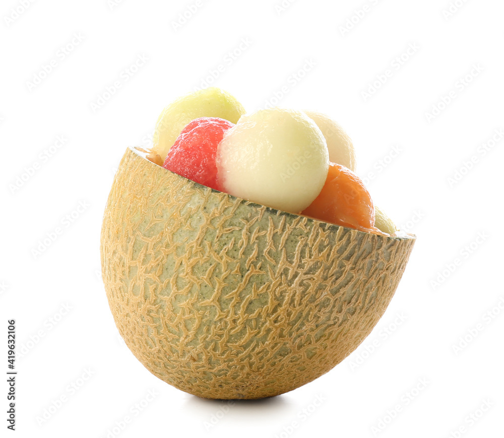 Melon bowl with sweet balls on white background