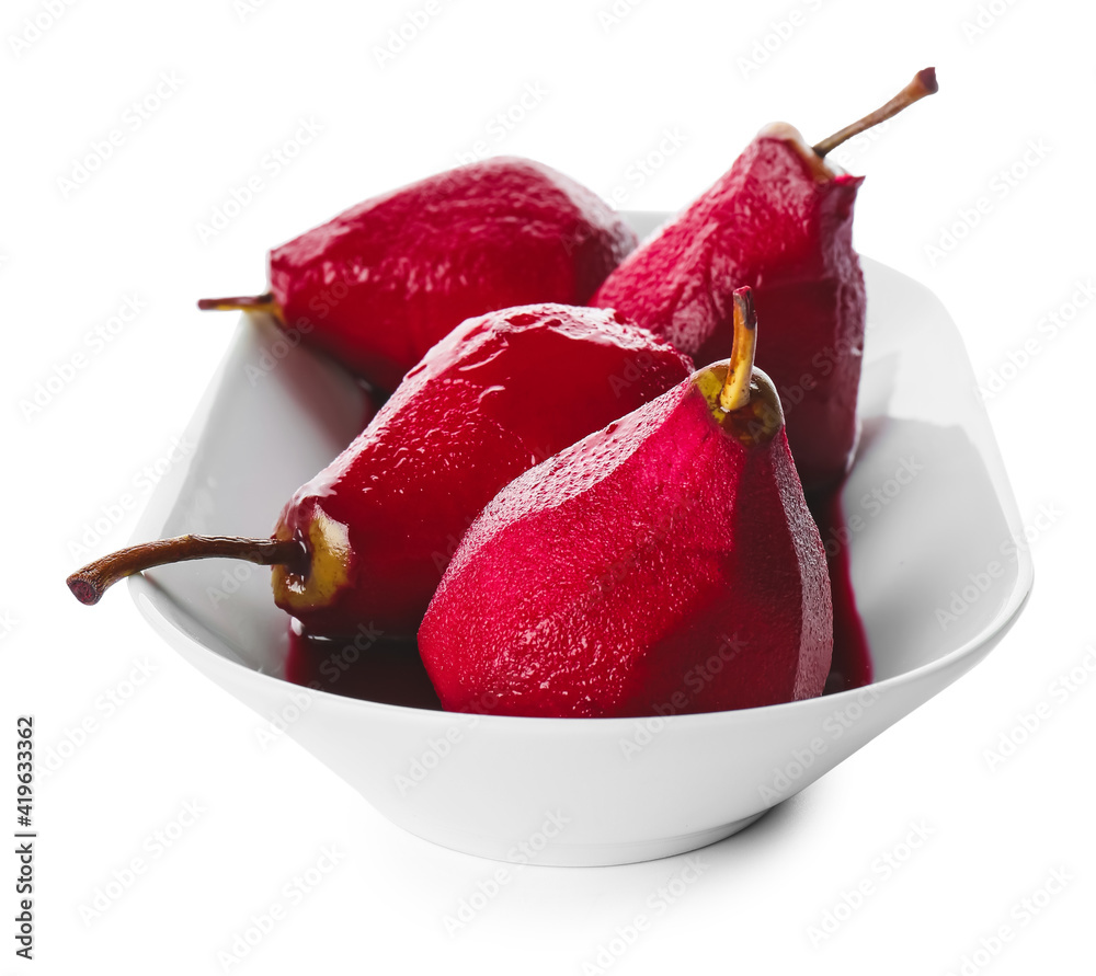 Plate of tasty poached pears in wine sauce on white background