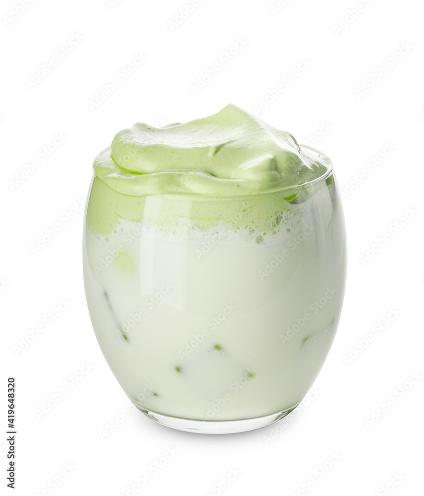 Glass of tasty dalgona matcha latte on white background