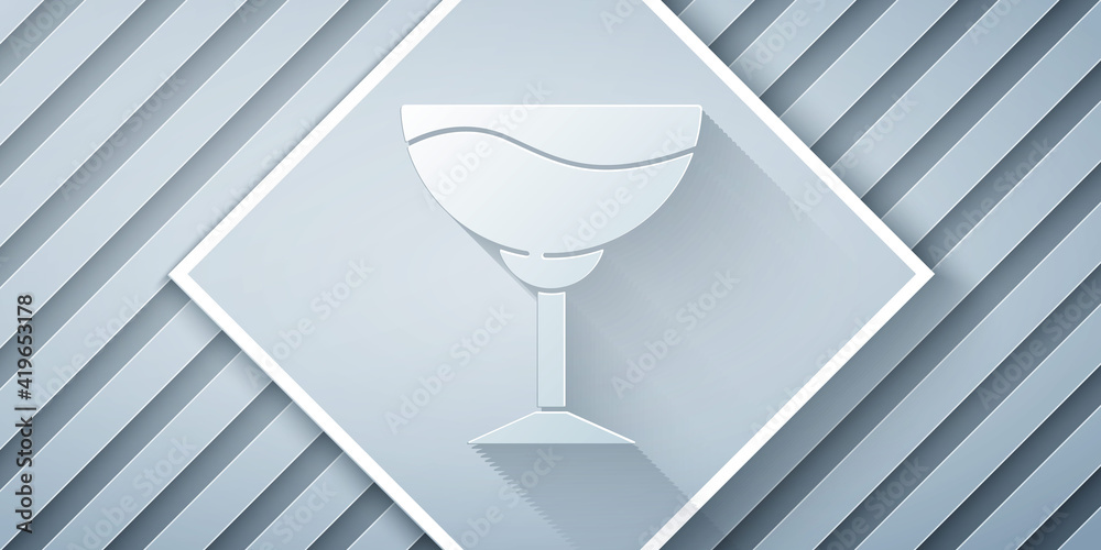 Paper cut Wine glass icon isolated on grey background. Wineglass sign. Paper art style. Vector.