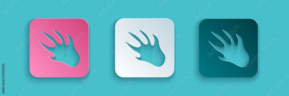 Paper cut Alligator crocodile paw footprint icon isolated on blue background. Paper art style. Vecto