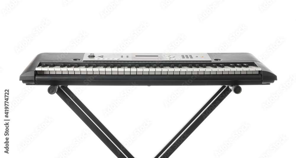 Modern synthesizer on white background, closeup