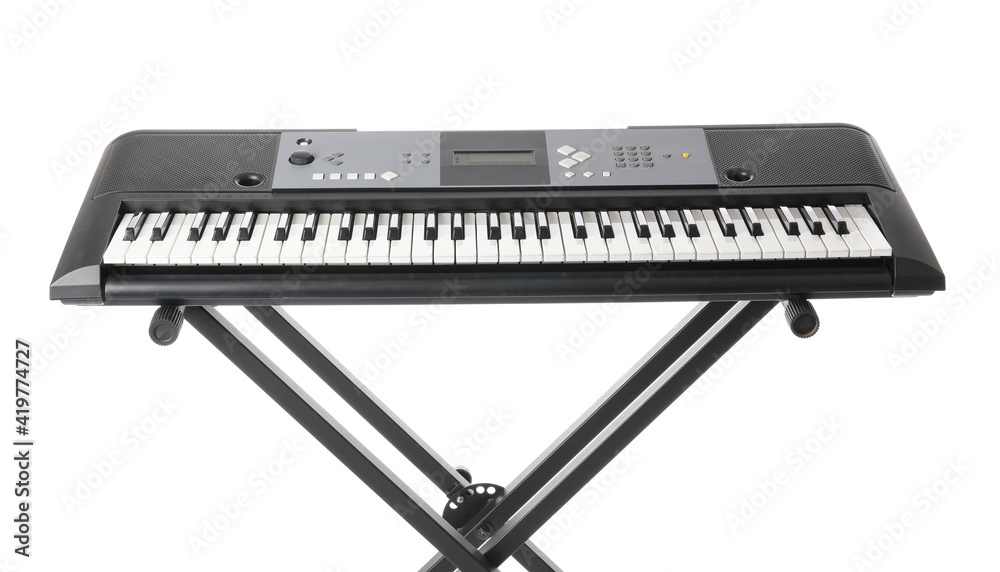 Modern synthesizer on white background, closeup