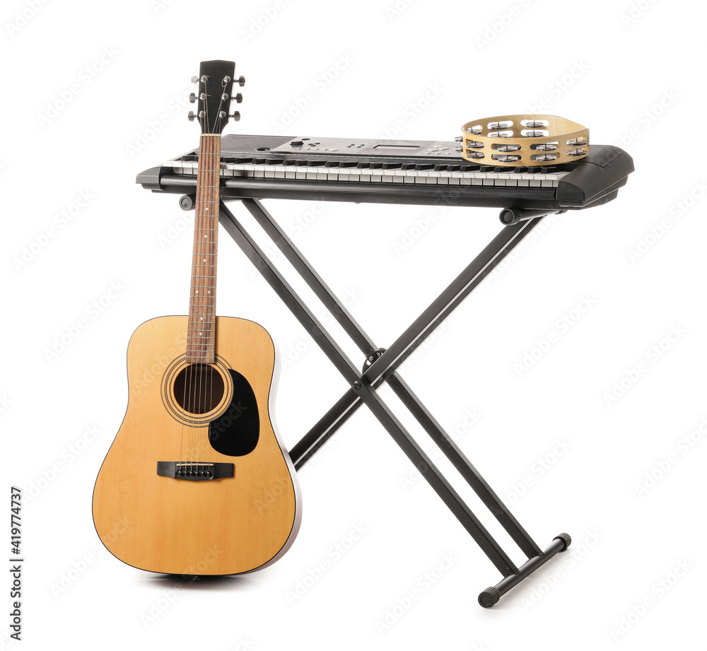 Different musical instruments on white background