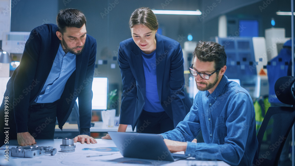 Modern Factory Office Meeting Room: Diverse Team of Engineers, Managers Talking at Conference Table,