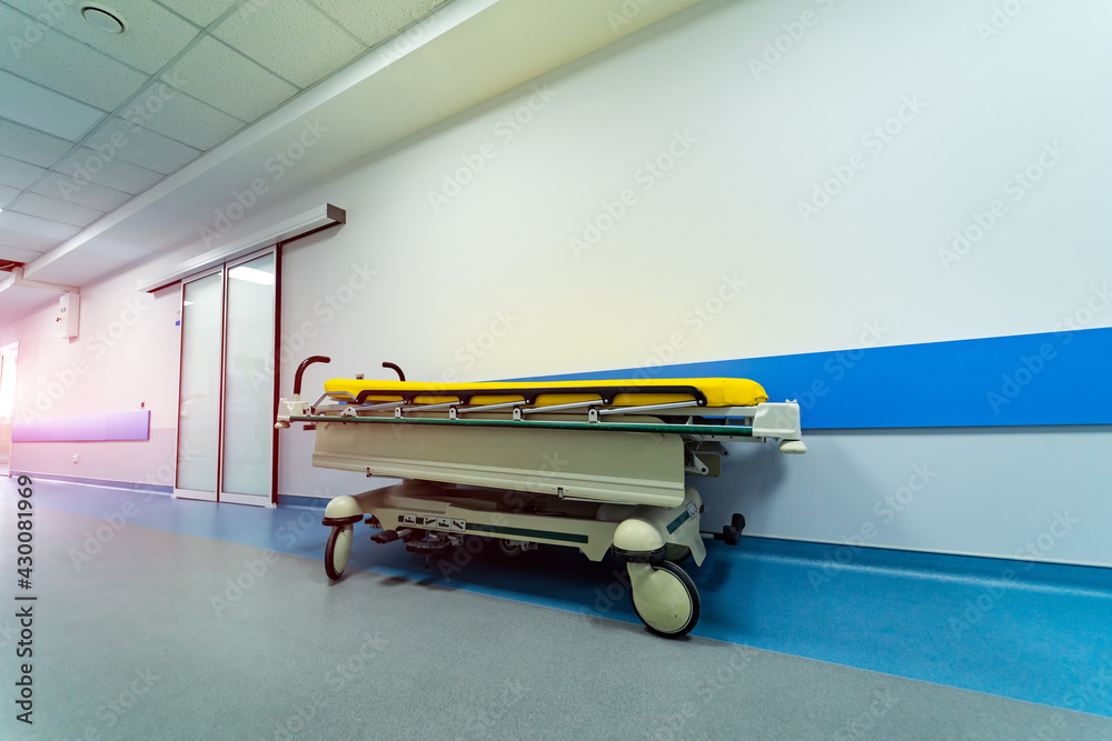 Modern medical interior in hospital. Clinical healthcare corridor with doors in ward.