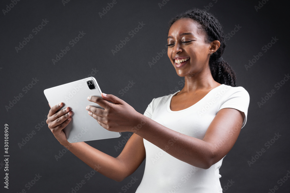 African American woman using digital tablet smart technology