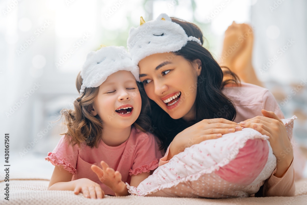 girl and mother enjoying sunny morning