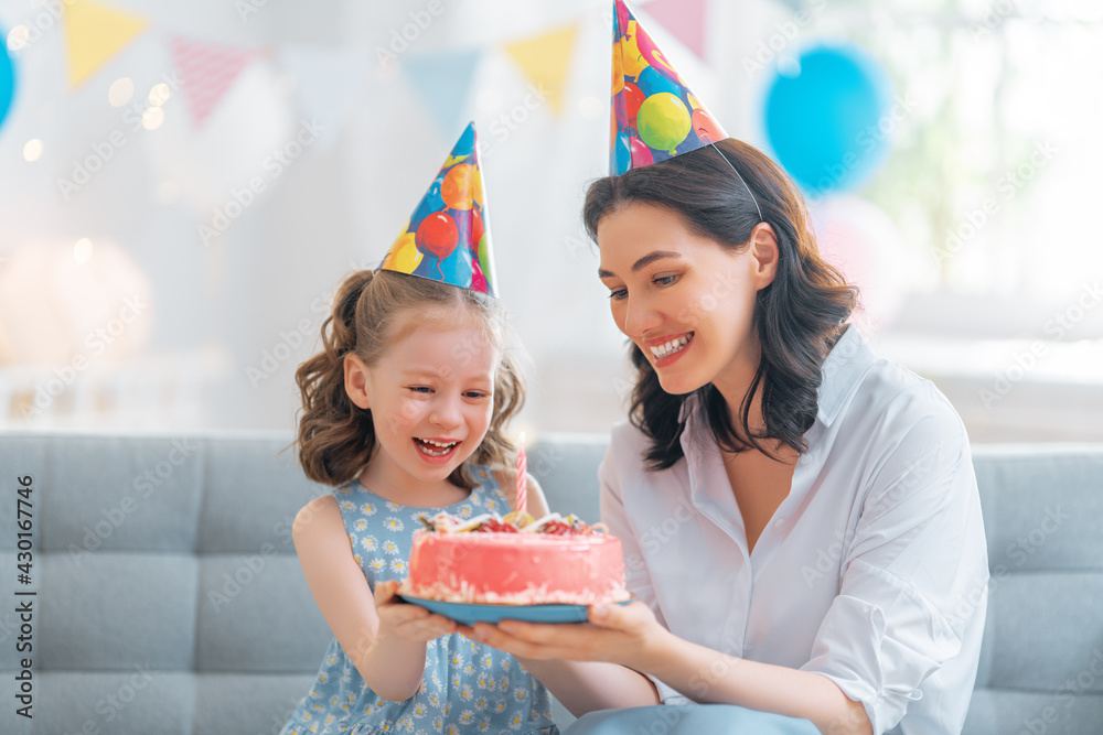 Mother and daughter are celebrating birthday.