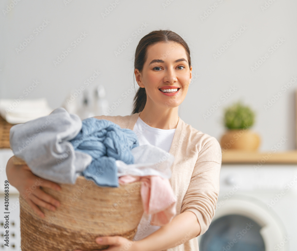 woman is doing laundry