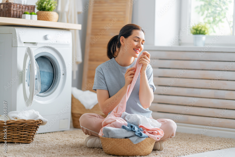 woman is doing laundry