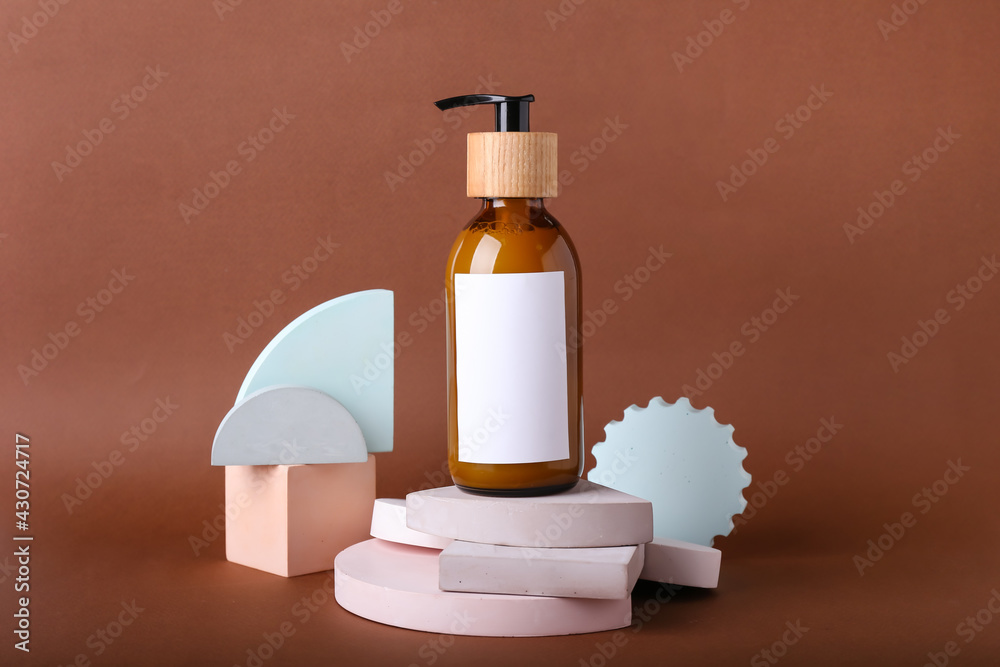 Bottle of shampoo for hair on color background