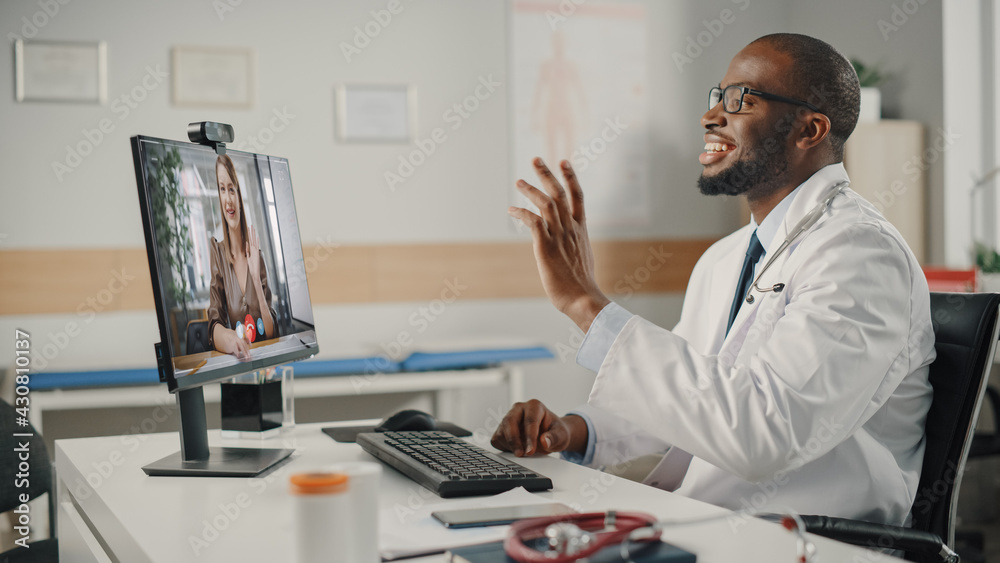 Doctors Online Medical Consultation: Black Handsome Physician is Making a Video Call with a Female 