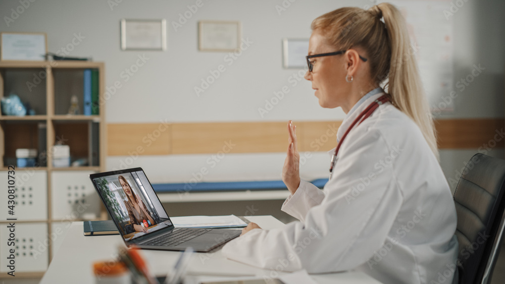 Doctors Online Medical Consultation: Handsome Famale Physician is Making a Video Call with a Female