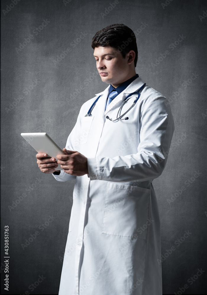 Doctor with a computer tablet