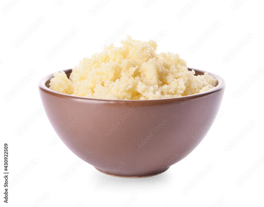 Bowl with tasty couscous on white background